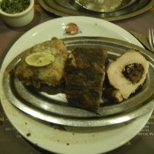 Fig stuffed pork loin, ribs, and chicken